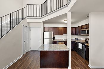 Fully-equipped kitchen with stainless steel appliances